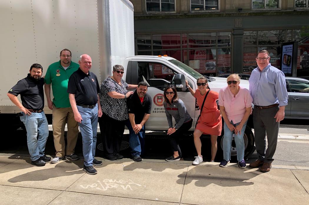 BC Dining staff assembled in front of the delivery truck